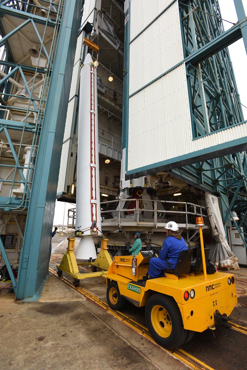 At Vandenberg Air Force Base in California, a solid rocket motor is lifted at Space Launch Complex 2 to be attached to a United Launch Alliance Delta II rocket. Preparations are continuing for launch of the Joint Polar Satellite System (JPSS-1) spacecraft on March 27, 2017. JPSS-1 is part of the next-generation environmental satellite system, a collaborative program between the National Oceanic and Atmospheric Administration (NOAA) and NASA. 