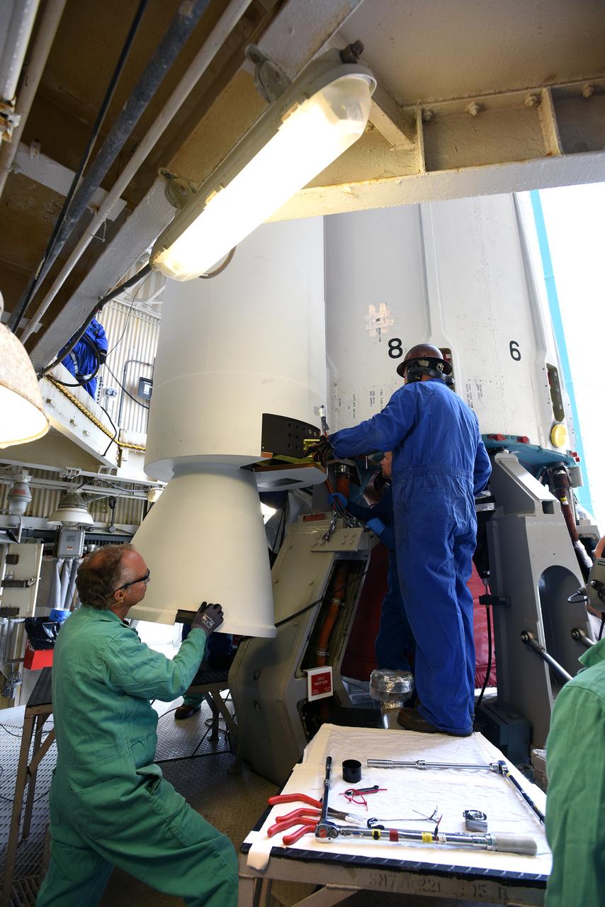 At Vandenberg Air Force Base in California, technicians inspect a solid rocket motor at Space Launch Complex 2 as it is attached to a United Launch Alliance Delta II rocket. Preparations are continuing for launch of the Joint Polar Satellite System (JPSS-1) spacecraft on March 27, 2017. JPSS-1 is part of the next-generation environmental satellite system, a collaborative program between the National Oceanic and Atmospheric Administration (NOAA) and NASA. 