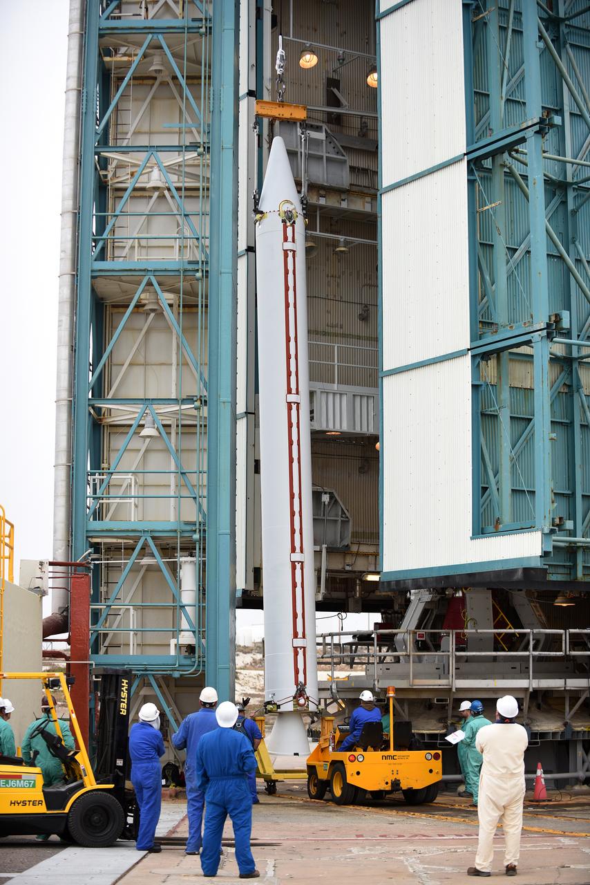 At Vandenberg Air Force Base in California, a solid rocket motor is lifted at Space Launch Complex 2 to be attached to a United Launch Alliance Delta II rocket. Preparations are continuing for launch of the Joint Polar Satellite System (JPSS-1) spacecraft on March 27, 2017. JPSS-1 is part of the next-generation environmental satellite system, a collaborative program between the National Oceanic and Atmospheric Administration (NOAA) and NASA. 