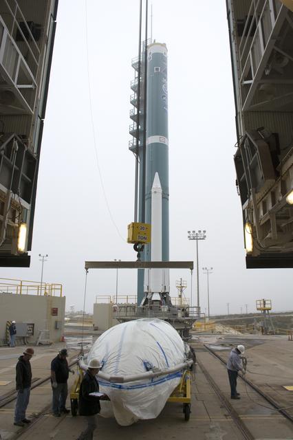 NASA image: Delta II JPSS-1 Fairing Bi-Sector Halves Hoisted to MST
