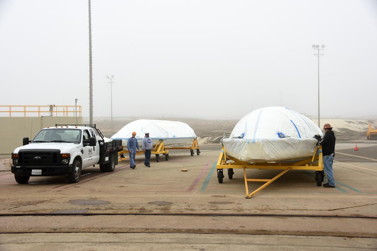 Bi-sector halves of the payload fairing for a United Launch Alliance Delta II rocket arrive at Space Launch Complex 2 on Vandenberg Air Force Base in California. Preparations are underway for launch of the Joint Polar Satellite System (JPSS-1) spacecraft in 2017. JPSS-1 is part of the next-generation environmental satellite system, a collaborative program between the National Oceanic and Atmospheric Administration (NOAA) and NASA. To learn more about JPSS-1, visit http://www.jpss.noaa.gov.