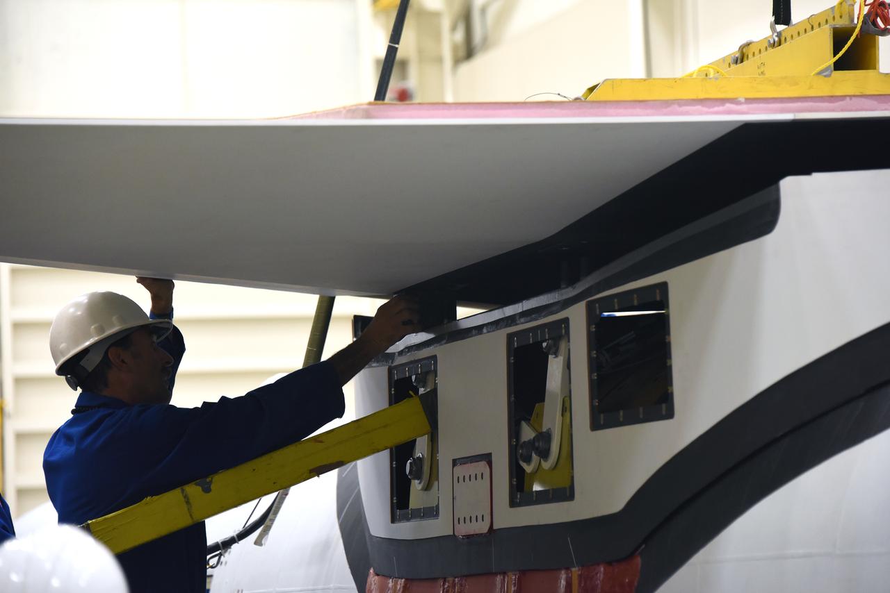 Inside Building 1555 at Vandenberg Air Force Base in California, technicians and engineers perform final wing installations on the Orbital ATK Pegasus XL rocket which will launch eight NASA Cyclone Global Navigation Satellite System, or CYGNSS, spacecraft. When preparations are completed at Vandenberg, the rocket, with CYGNSS in its payload fairing, will be attached to the Orbital ATK L-1011 carrier aircraft and transported to NASA’s Kennedy Space Center in Florida. On Dec. 12, 2016, the carrier aircraft is scheduled to take off from the Skid Strip at Cape Canaveral Air Force Station and CYGNSS will launch on the Pegasus XL rocket with the L-1011 flying off shore. CYGNSS will make frequent and accurate measurements of ocean surface winds throughout the life cycle of tropical storms and hurricanes. The data that CYGNSS provides will enable scientists to probe key air-sea interaction processes that take place near the core of storms, which are rapidly changing and play a critical role in the beginning and intensification of hurricanes.
