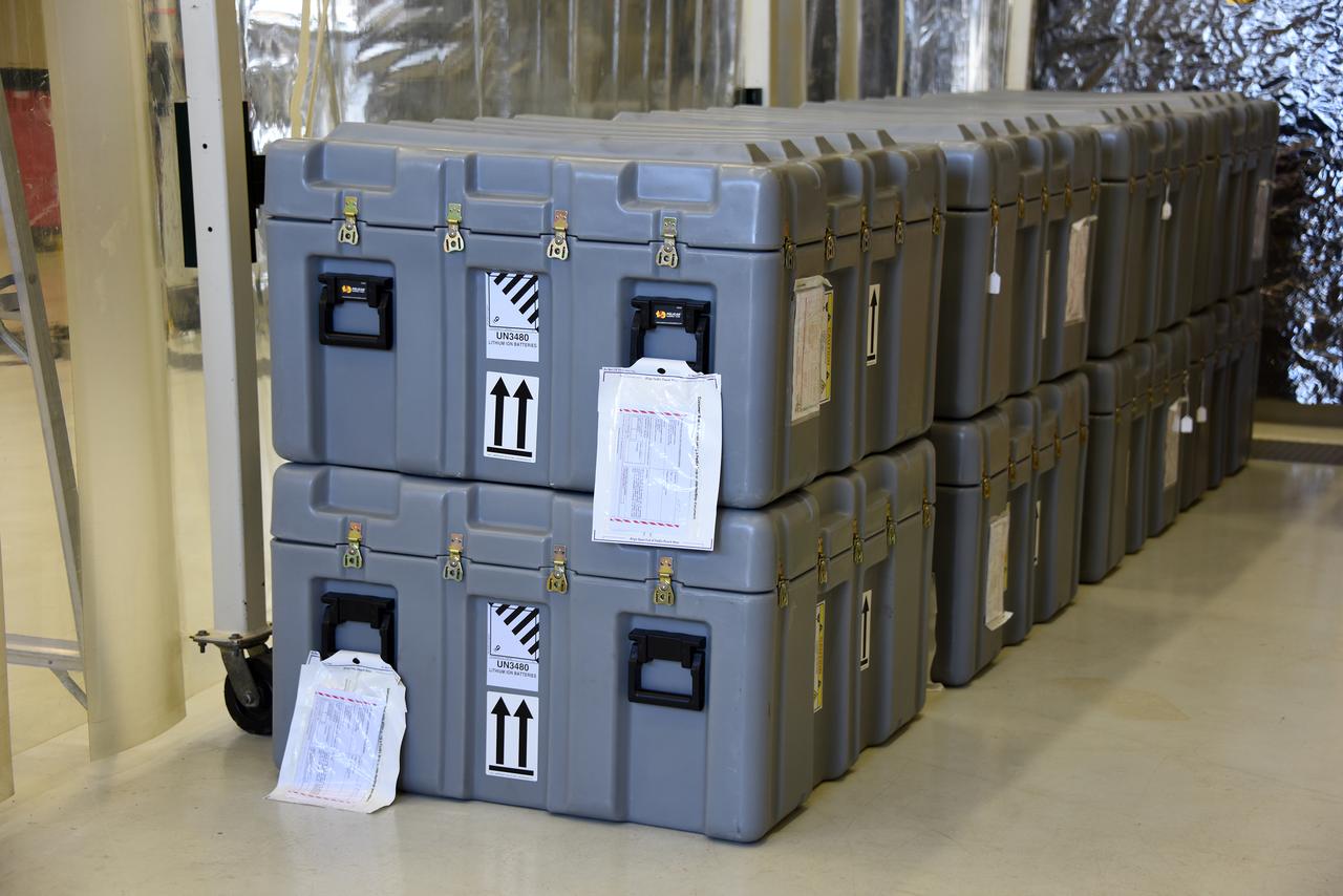 Parts for NASA’s Cyclone Global Navigation Satellite System (CYGNSS) arrive in shipping containers and are stacked inside Building 1555 at Vandenberg Air Force Base in California. CYGNSS is being prepared at Vandenberg, and then will be transported to NASA’s Kennedy Space Center in Florida in the Orbital ATK Pegasus XL rocket which will be attached to the Orbital ATK L-1011 carrier aircraft. CYGNSS will launch on the Pegasus XL rocket from the Skid Strip at Cape Canaveral Air Force Station. CYGNSS will make frequent and accurate measurements of ocean surface winds throughout the life cycle of tropical storms and hurricanes. The data that CYGNSS provides will enable scientists to probe key air-sea interaction processes that take place near the core of storms, which are rapidly changing and play a critical role in the beginning and intensification of hurricanes.