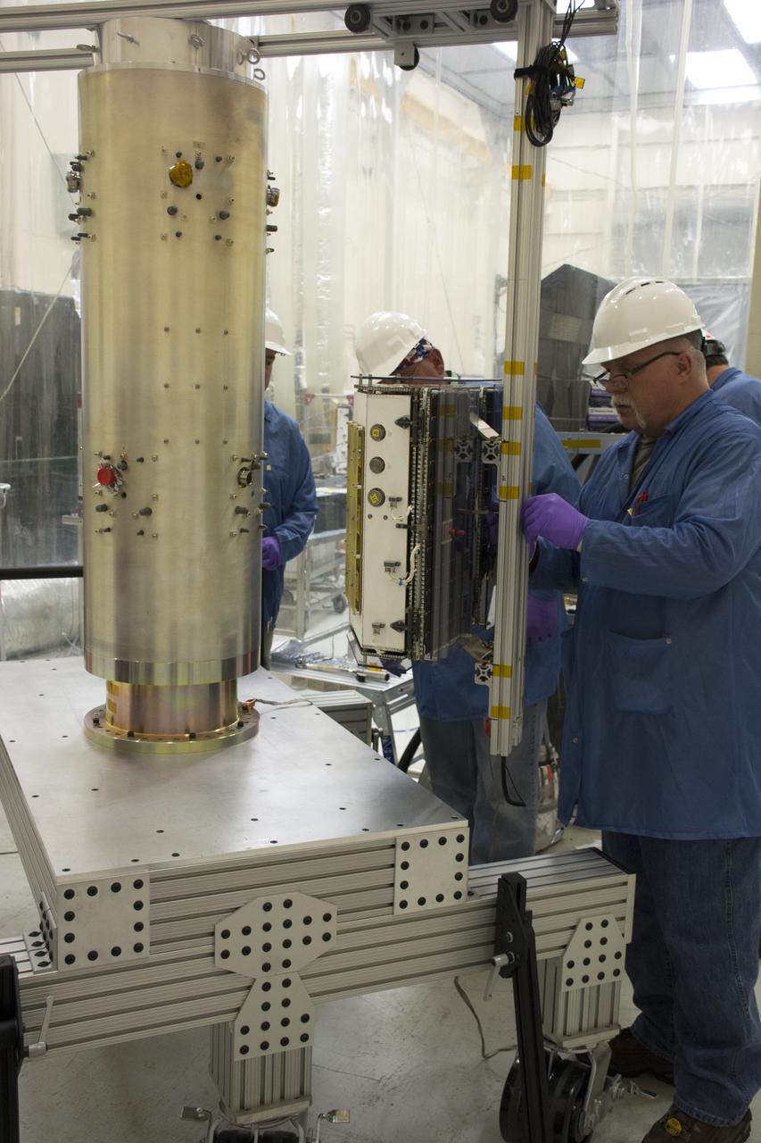 Inside Building 1555 at Vandenberg Air Force Base in California, one of eight NASA Cyclone Global Navigation Satellite System (CYGNSS) spacecraft is installed on its deployment module. Processing activities will prepare the spacecraft for launch aboard an Orbital ATK Pegasus XL rocket. When preparations are competed at Vandenberg, the rocket will be transported to NASA’s Kennedy Space Center in Florida attached to the Orbital ATK L-1011 carrier aircraft with in its payload fairing. CYGNSS will launch on the Pegasus XL rocket from the Skid Strip at Cape Canaveral Air Force Station. CYGNSS will make frequent and accurate measurements of ocean surface winds throughout the life cycle of tropical storms and hurricanes. The data that CYGNSS provides will enable scientists to probe key air-sea interaction processes that take place near the core of storms, which are rapidly changing and play a critical role in the beginning and intensification of hurricanes.