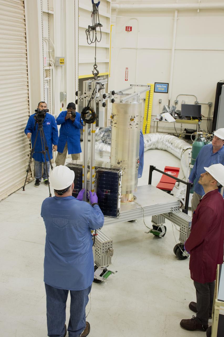 Inside Building 1555 at Vandenberg Air Force Base in California, technicians and engineers install one of eight NASA Cyclone Global Navigation Satellite System (CYGNSS) spacecraft on its deployment module. Processing activities will prepare the spacecraft for launch aboard an Orbital ATK Pegasus XL rocket. When preparations are competed at Vandenberg, the rocket will be transported to NASA’s Kennedy Space Center in Florida attached to the Orbital ATK L-1011 carrier aircraft with in its payload fairing. CYGNSS will launch on the Pegasus XL rocket from the Skid Strip at Cape Canaveral Air Force Station. CYGNSS will make frequent and accurate measurements of ocean surface winds throughout the life cycle of tropical storms and hurricanes. The data that CYGNSS provides will enable scientists to probe key air-sea interaction processes that take place near the core of storms, which are rapidly changing and play a critical role in the beginning and intensification of hurricanes.