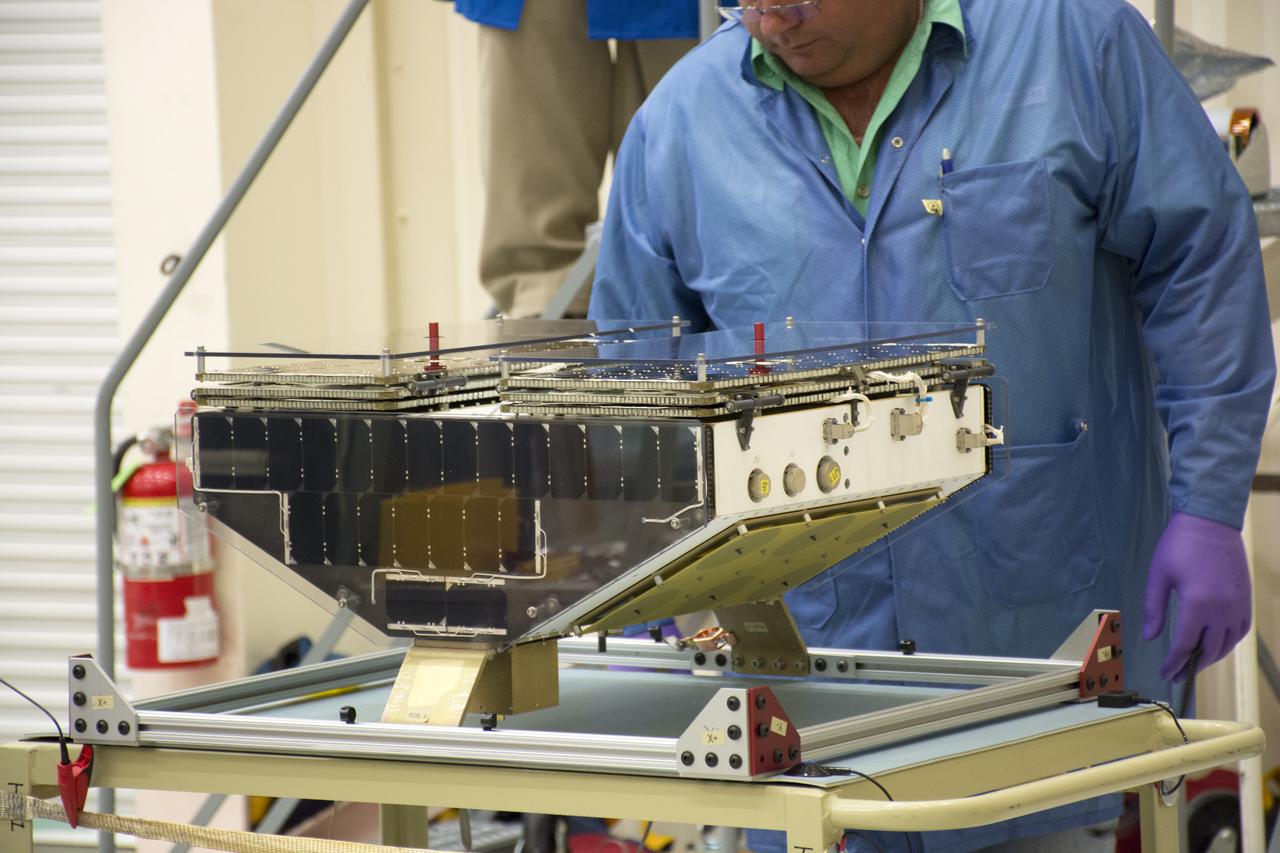 Inside Building 1555 at Vandenberg Air Force Base in California, technicians and engineers install one of eight NASA Cyclone Global Navigation Satellite System (CYGNSS) spacecraft on its deployment module. Processing activities will prepare the spacecraft for launch aboard an Orbital ATK Pegasus XL rocket. When preparations are competed at Vandenberg, the rocket will be transported to NASA’s Kennedy Space Center in Florida attached to the Orbital ATK L-1011 carrier aircraft with in its payload fairing. CYGNSS will launch on the Pegasus XL rocket from the Skid Strip at Cape Canaveral Air Force Station. CYGNSS will make frequent and accurate measurements of ocean surface winds throughout the life cycle of tropical storms and hurricanes. The data that CYGNSS provides will enable scientists to probe key air-sea interaction processes that take place near the core of storms, which are rapidly changing and play a critical role in the beginning and intensification of hurricanes.