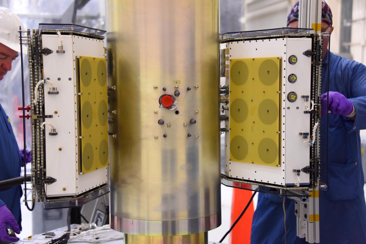 Technicians with Orbital ATK install the first two sets of micro satellites on the deployment module for NASA’s Cyclone Global Navigation Satellite System (CYGNSS) in Building 1555 at Vandenberg Air Force Base in California. CYGNSS is being prepared at Vandenberg, and then will be transported to NASA’s Kennedy Space Center in Florida aboard the Orbital ATK Pegasus XL rocket which will be attached to the Orbital ATK L-1011 carrier aircraft. CYGNSS will launch on the Pegasus XL rocket from the Skid Strip at Cape Canaveral Air Force Station. CYGNSS will make frequent and accurate measurements of ocean surface winds throughout the life cycle of tropical storms and hurricanes. The data that CYGNSS provides will enable scientists to probe key air-sea interaction processes that take place near the core of storms, which are rapidly changing and play a critical role in the beginning and intensification of hurricanes. 