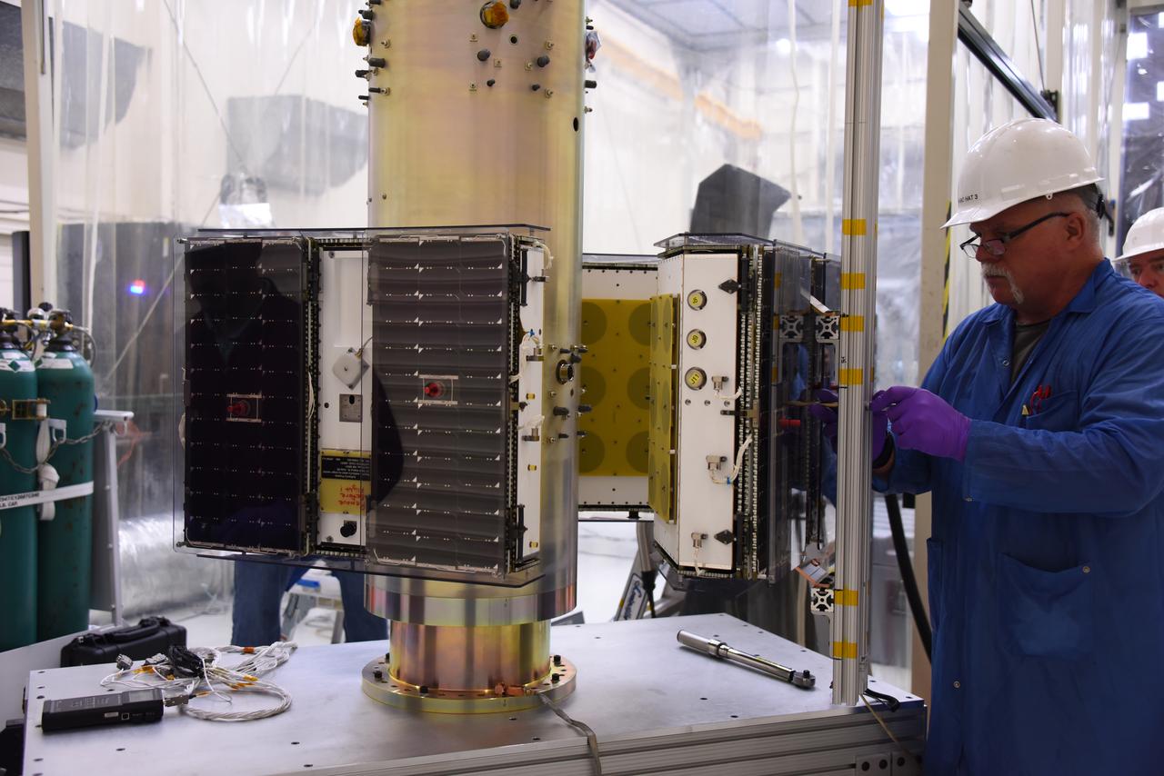 A technician with Orbital ATK prepares a set of micro satellites for installation on the deployment module for NASA’s Cyclone Global Navigation Satellite System (CYGNSS) in Building 1555 at Vandenberg Air Force Base in California. CYGNSS is being prepared at Vandenberg, and then will be transported to NASA’s Kennedy Space Center in Florida aboard the Orbital ATK Pegasus XL rocket which will be attached to the Orbital ATK L-1011 carrier aircraft. CYGNSS will launch on the Pegasus XL rocket from the Skid Strip at Cape Canaveral Air Force Station. CYGNSS will make frequent and accurate measurements of ocean surface winds throughout the life cycle of tropical storms and hurricanes. The data that CYGNSS provides will enable scientists to probe key air-sea interaction processes that take place near the core of storms, which are rapidly changing and play a critical role in the beginning and intensification of hurricanes. 