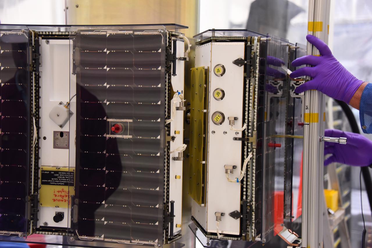 Technicians with Orbital ATK prepare a set of micro satellites for installation on the deployment module for NASA’s Cyclone Global Navigation Satellite System (CYGNSS) in Building 1555 at Vandenberg Air Force Base in California. CYGNSS is being prepared at Vandenberg, and then will be transported to NASA’s Kennedy Space Center in Florida aboard the Orbital ATK Pegasus XL rocket which will be attached to the Orbital ATK L-1011 carrier aircraft. CYGNSS will launch on the Pegasus XL rocket from the Skid Strip at Cape Canaveral Air Force Station. CYGNSS will make frequent and accurate measurements of ocean surface winds throughout the life cycle of tropical storms and hurricanes. The data that CYGNSS provides will enable scientists to probe key air-sea interaction processes that take place near the core of storms, which are rapidly changing and play a critical role in the beginning and intensification of hurricanes. 