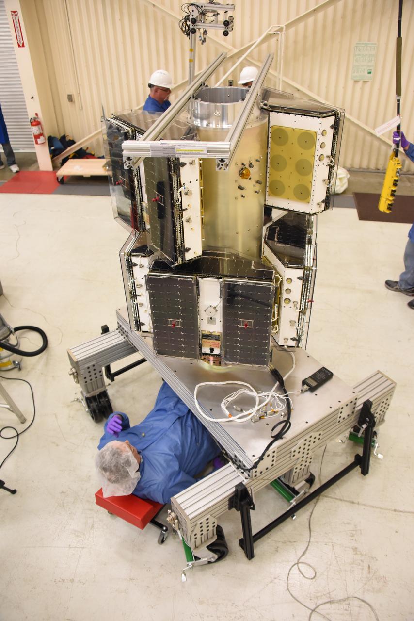Technicians with Orbital ATK continue to install the micro satellites on the deployment module for NASA’s Cyclone Global Navigation Satellite System (CYGNSS) in Building 1555 at Vandenberg Air Force Base in California. CYGNSS is being prepared at Vandenberg, and then will be transported to NASA’s Kennedy Space Center in Florida aboard the Orbital ATK Pegasus XL rocket which will be attached to the Orbital ATK L-1011 carrier aircraft. CYGNSS will launch on the Pegasus XL rocket from the Skid Strip at Cape Canaveral Air Force Station. CYGNSS will make frequent and accurate measurements of ocean surface winds throughout the life cycle of tropical storms and hurricanes. The data that CYGNSS provides will enable scientists to probe key air-sea interaction processes that take place near the core of storms, which are rapidly changing and play a critical role in the beginning and intensification of hurricanes. 