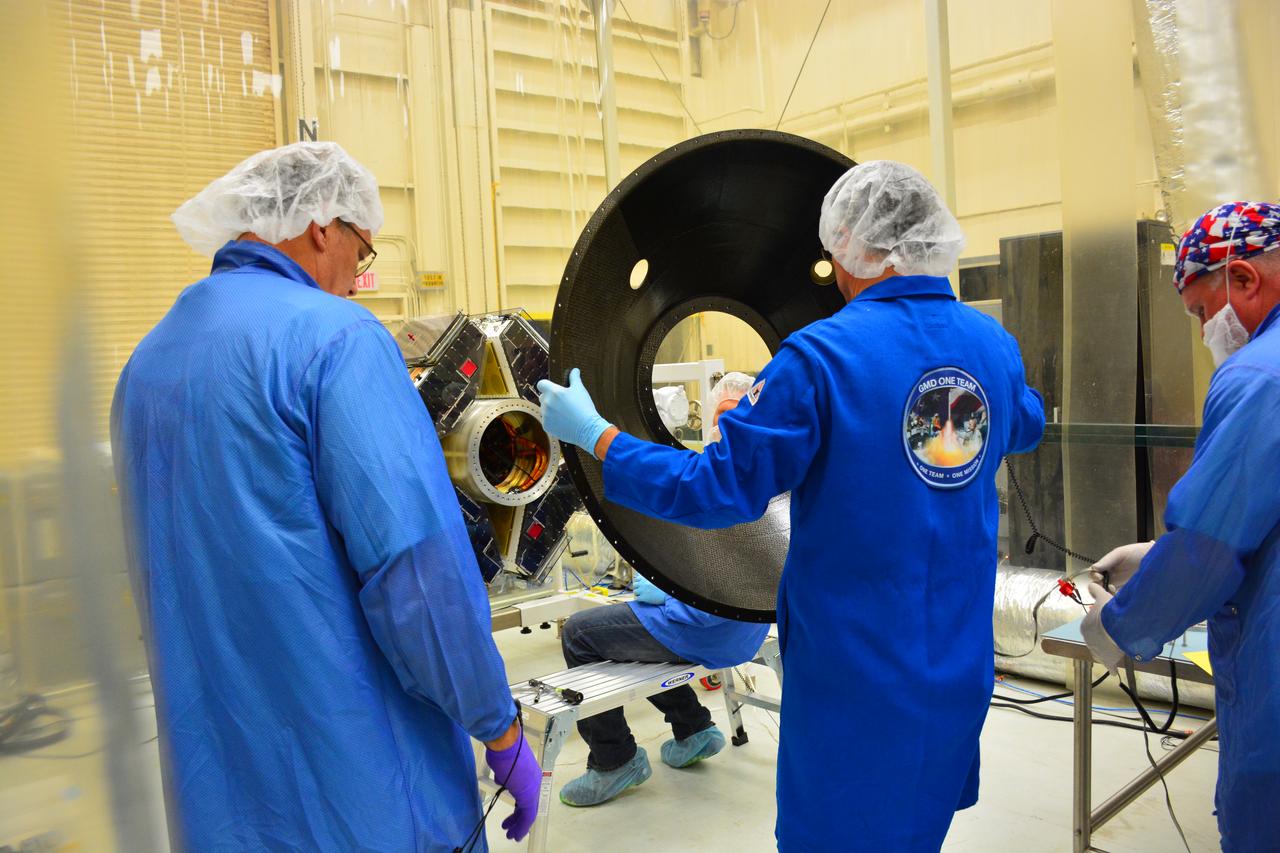 Technicians with Orbital ATK prepare to install the payload adapter to the deployment module that contains the micro satellites for NASA’s Cyclone Global Navigation Satellite System (CYGNSS) in Building 1555 at Vandenberg Air Force Base in California. CYGNSS is being prepared at Vandenberg, and then will be transported to NASA’s Kennedy Space Center in Florida aboard the Orbital ATK Pegasus XL rocket which will be attached to the Orbital ATK L-1011 carrier aircraft. CYGNSS will launch on the Pegasus XL rocket from the Skid Strip at Cape Canaveral Air Force Station. CYGNSS will make frequent and accurate measurements of ocean surface winds throughout the life cycle of tropical storms and hurricanes. The data that CYGNSS provides will enable scientists to probe key air-sea interaction processes that take place near the core of storms, which are rapidly changing and play a critical role in the beginning and intensification of hurricanes. 
