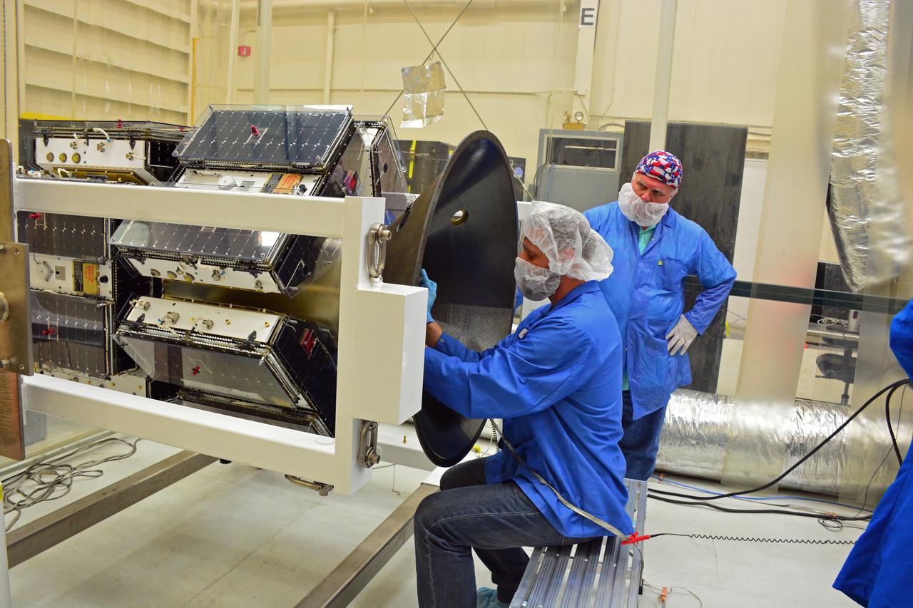 Technicians with Orbital ATK install the payload adapter to the deployment module that contains the micro satellites for NASA’s Cyclone Global Navigation Satellite System (CYGNSS) in Building 1555 at Vandenberg Air Force Base in California. CYGNSS is being prepared at Vandenberg, and then will be transported to NASA’s Kennedy Space Center in Florida aboard the Orbital ATK Pegasus XL rocket which will be attached to the Orbital ATK L-1011 carrier aircraft. CYGNSS will launch on the Pegasus XL rocket from the Skid Strip at Cape Canaveral Air Force Station. CYGNSS will make frequent and accurate measurements of ocean surface winds throughout the life cycle of tropical storms and hurricanes. The data that CYGNSS provides will enable scientists to probe key air-sea interaction processes that take place near the core of storms, which are rapidly changing and play a critical role in the beginning and intensification of hurricanes.