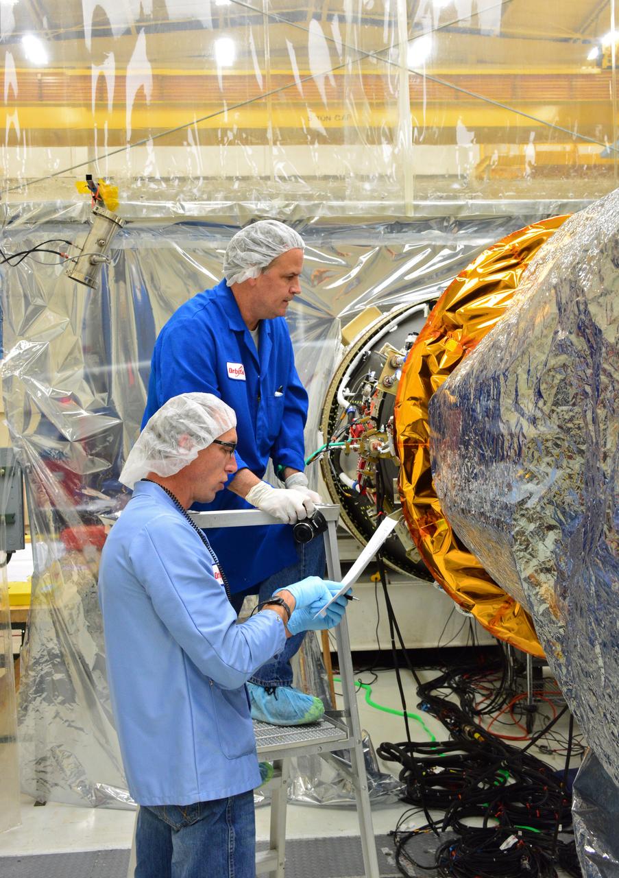 In Building 1555 at Vandenberg Air Force Base in California, the payload fairing is being installed on an Orbital ATK Pegasus XL rocket. On board Pegasus are eight NASA Cyclone Global Navigation Satellite System, or CYGNSS, spacecraft. When preparations are competed at Vandenberg, the L-1011/Pegasus XL combination will be flown to NASA’s Kennedy Space Center in Florida. On Dec. 12, 2016, the carrier aircraft is scheduled to take off from the Skid Strip at Cape Canaveral Air Force Station and CYGNSS will launch on the Pegasus XL rocket with the L-1011 flying off shore. CYGNSS satellites will make frequent and accurate measurements of ocean surface winds throughout the life cycle of tropical storms and hurricanes. The data that CYGNSS provides will help scientists to probe key air-sea interaction processes that take place near the core of storms, which are rapidly changing and play a crucial role in the beginning and intensification of hurricanes.