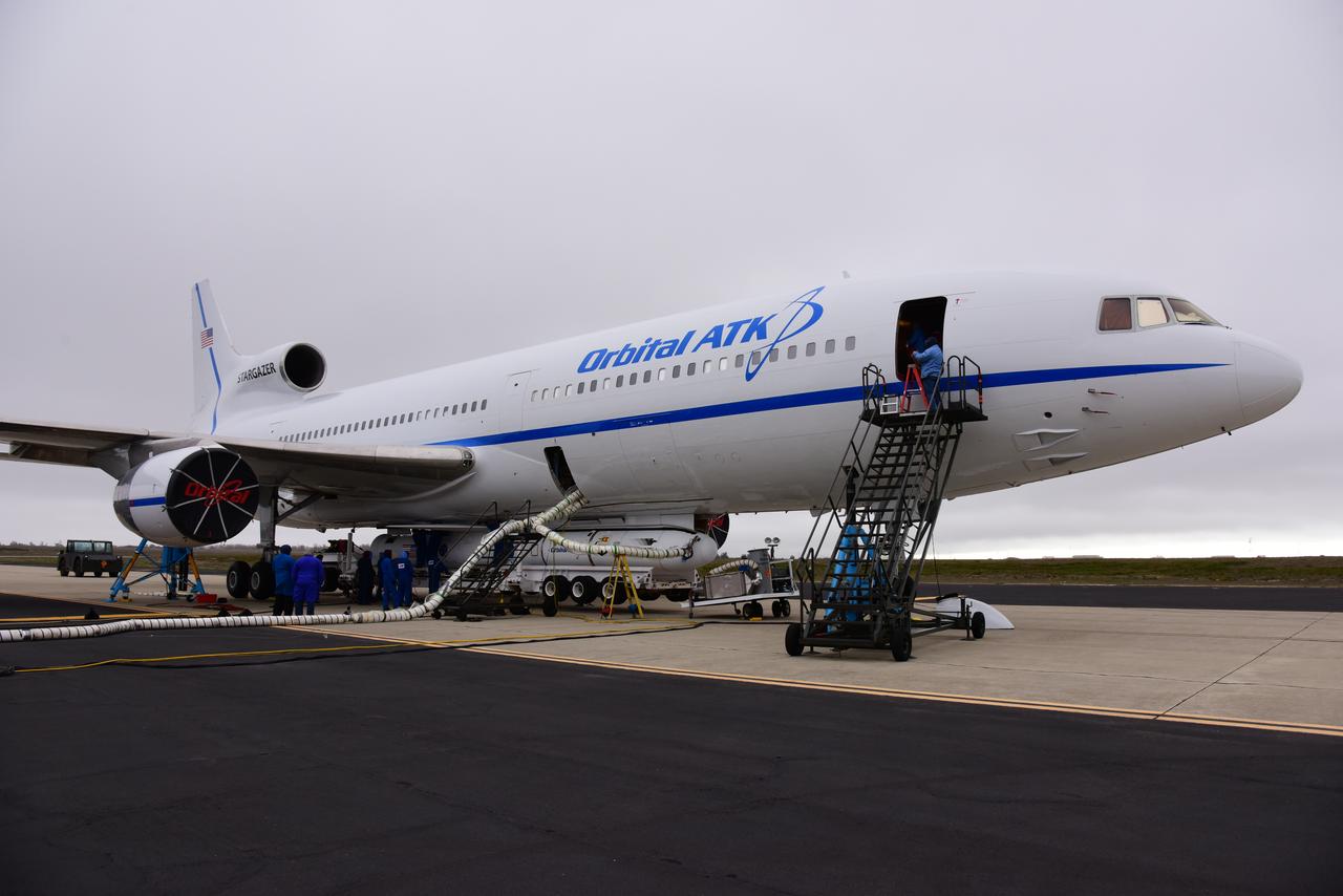 At Vandenberg Air Force Base in California, an Orbital ATK Pegasus XL rocket is mated to the company's L-1011 carrier aircraft near Vandenberg's runway. On board Pegasus are eight NASA Cyclone Global Navigation Satellite System, or CYGNSS, spacecraft. When preparations are competed at Vandenberg, the L-1011/Pegasus XL combination will be flown to NASA’s Kennedy Space Center in Florida. On Dec. 12, 2016, the carrier aircraft is scheduled to take off from the Skid Strip at Cape Canaveral Air Force Station and CYGNSS will launch on the Pegasus XL rocket with the L-1011 flying off shore. CYGNSS satellites will make frequent and accurate measurements of ocean surface winds throughout the life cycle of tropical storms and hurricanes. The data that CYGNSS provides will enable scientists to probe key air-sea interaction processes that take place near the core of storms, which are rapidly changing and play a critical role in the beginning and intensification of hurricanes.
