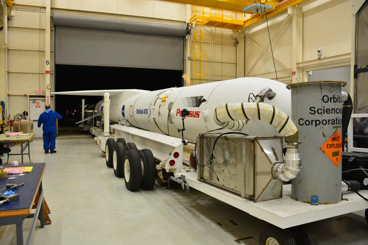 At Vandenberg Air Force Base in California, an Orbital ATK Pegasus XL rocket is transported from the hangar at Building 1555 to be mated to L-1011 carrier aircraft near Vandenberg's runway. On board Pegasus are eight NASA Cyclone Global Navigation Satellite System, or CYGNSS, spacecraft. When preparations are competed at Vandenberg, the L-1011/Pegasus XL combination will be flown to NASA’s Kennedy Space Center in Florida. On Dec. 12, 2016, the carrier aircraft is scheduled to take off from the Skid Strip at Cape Canaveral Air Force Station and CYGNSS will launch on the Pegasus XL rocket with the L-1011 flying off shore. CYGNSS satellites will make frequent and accurate measurements of ocean surface winds throughout the life cycle of tropical storms and hurricanes. The data that CYGNSS provides will enable scientists to probe key air-sea interaction processes that take place near the core of storms, which are rapidly changing and play a critical role in the beginning and intensification of hurricanes.