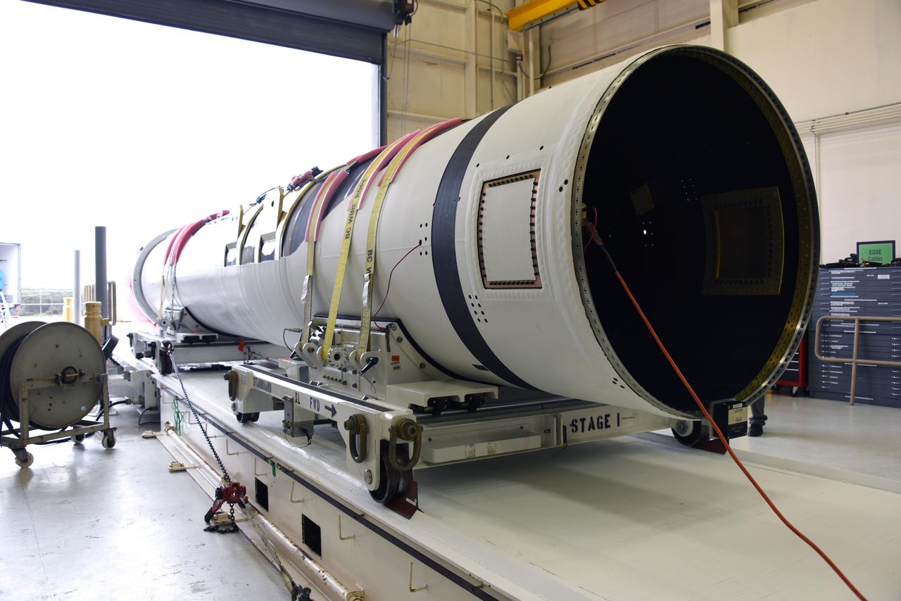 The first stage motor for the Orbital ATK Pegasus XL rocket was moved inside Building 1555 at Vandenberg Air Force Base in California. In the background are the second and third stage segments. The rocket is being prepared for NASA's Ionospheric Connection Explorer, or ICON, mission. ICON will launch from the Kwajalein Atoll aboard the Pegasus XL on Dec. 8, 2017. ICON will study the frontier of space - the dynamic zone high in Earth's atmosphere where terrestrial weather from below meets space weather above. The explorer will help determine the physics of Earth's space environment and pave the way for mitigating its effects on our technology, communications systems and society. 