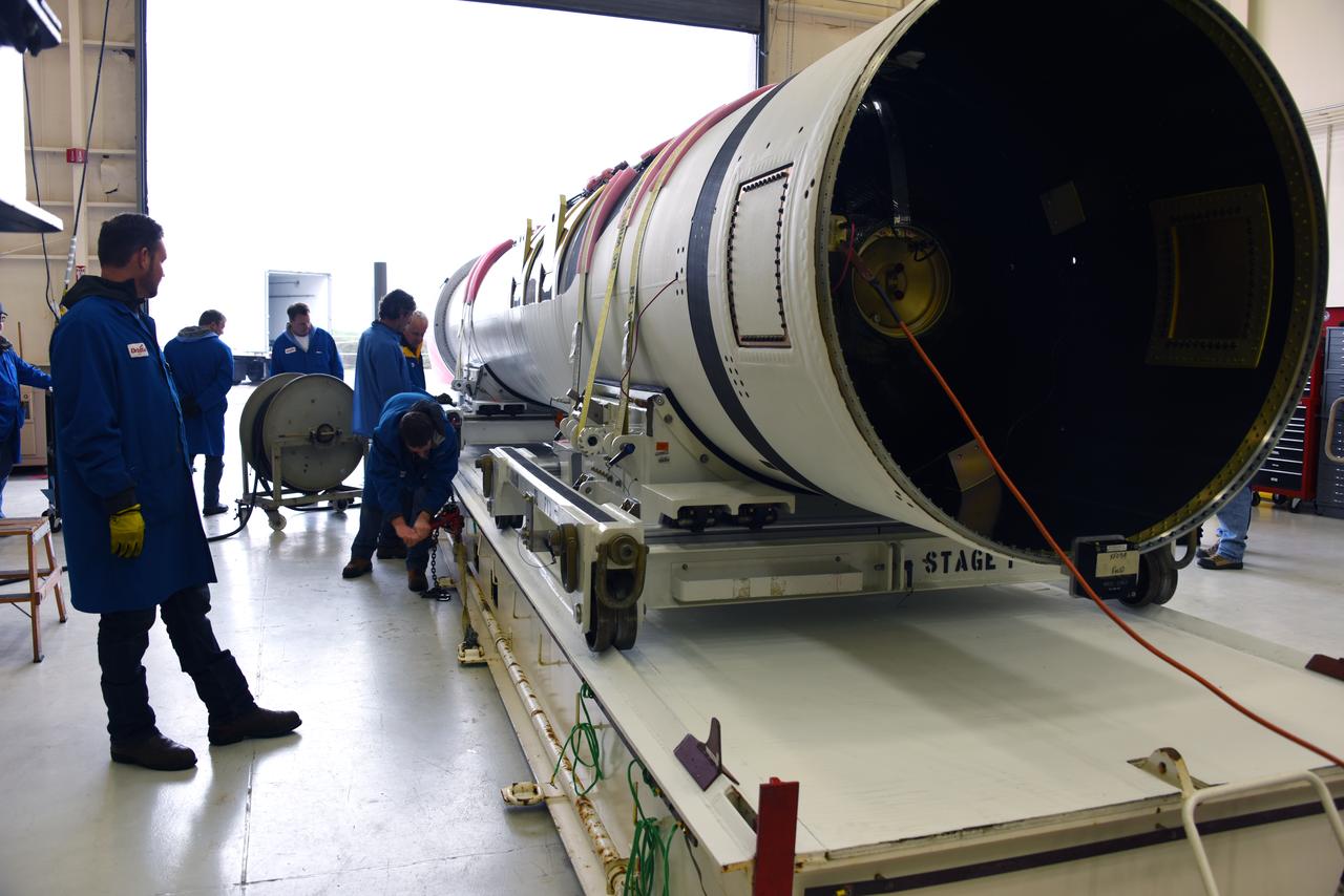 The first stage motor for the Orbital ATK Pegasus XL rocket was moved inside Building 1555 at Vandenberg Air Force Base in California. In the background are the second and third stage segments. The rocket is being prepared for NASA's Ionospheric Connection Explorer, or ICON, mission. ICON will launch from the Kwajalein Atoll aboard the Pegasus XL on Dec. 8, 2017. ICON will study the frontier of space - the dynamic zone high in Earth's atmosphere where terrestrial weather from below meets space weather above. The explorer will help determine the physics of Earth's space environment and pave the way for mitigating its effects on our technology, communications systems and society. 