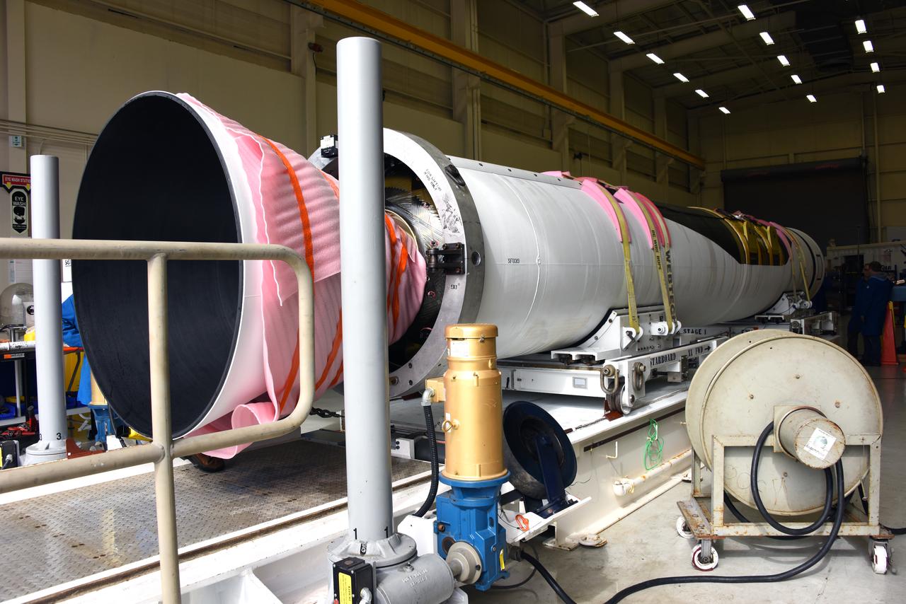 The first stage motor for the Orbital ATK Pegasus XL rocket was moved inside Building 1555 at Vandenberg Air Force Base in California. In the background are the second and third stage segments. The rocket is being prepared for NASA's Ionospheric Connection Explorer, or ICON, mission. ICON will launch from the Kwajalein Atoll aboard the Pegasus XL on Dec. 8, 2017. ICON will study the frontier of space - the dynamic zone high in Earth's atmosphere where terrestrial weather from below meets space weather above. The explorer will help determine the physics of Earth's space environment and pave the way for mitigating its effects on our technology, communications systems and society.
