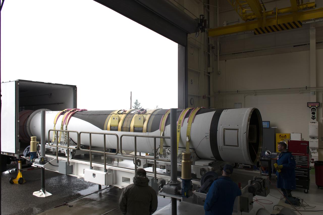 The first stage motor for the Orbital ATK Pegasus XL rocket arrives by truck at Building 1555 at Vandenberg Air Force Base in California. The Pegasus rocket is being prepared for NASA's Ionospheric Connection Explorer, or ICON, mission. ICON will launch from the Kwajalein Atoll aboard the Pegasus XL on Dec. 8, 2017. ICON will study the frontier of space - the dynamic zone high in Earth's atmosphere where terrestrial weather from below meets space weather above. The explorer will help determine the physics of Earth's space environment and pave the way for mitigating its effects on our technology, communications systems and society. 