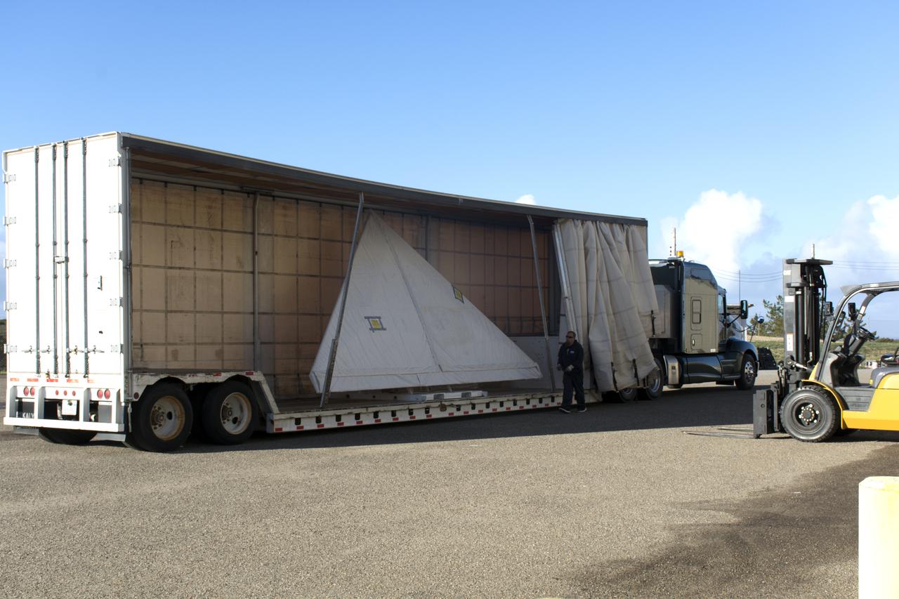 The wing for the Orbital ATK Pegasus XL rocket arrives by truck at Building 1555 at Vandenberg Air Force Base in California. The Pegasus rocket is being prepared for NASA's Ionospheric Connection Explorer, or ICON, mission. ICON will launch from the Kwajalein Atoll aboard the Pegasus XL on Dec. 8, 2017. ICON will study the frontier of space - the dynamic zone high in Earth's atmosphere where terrestrial weather from below meets space weather above. The explorer will help determine the physics of Earth's space environment and pave the way for mitigating its effects on our technology, communications systems and society. 