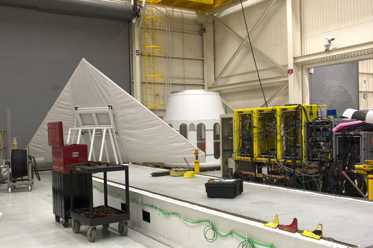 The wing for the Orbital ATK Pegasus XL rocket was offloaded from a truck and transporter to Building 1555 at Vandenberg Air Force Base in California. The rocket is being prepared for NASA's Ionospheric Connection Explorer, or ICON, mission. ICON will launch from the Kwajalein Atoll aboard the Pegasus XL on Dec. 8, 2017. ICON will study the frontier of space - the dynamic zone high in Earth's atmosphere where terrestrial weather from below meets space weather above. The explorer will help determine the physics of Earth's space environment and pave the way for mitigating its effects on our technology, communications systems and society. 