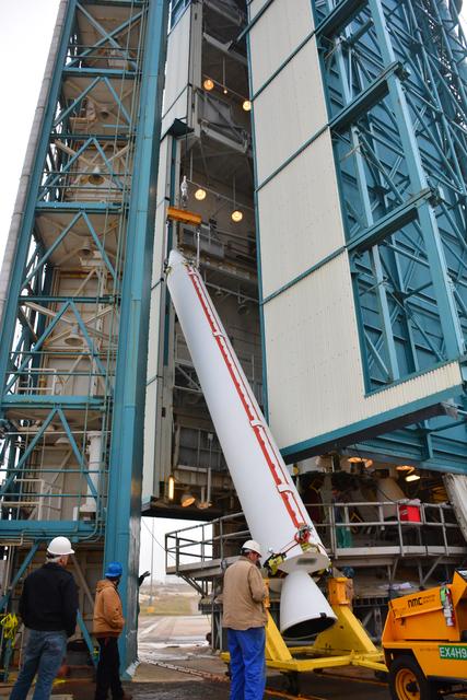 NASA image: Delta II JPSS-1 SRM Installation onto Booster