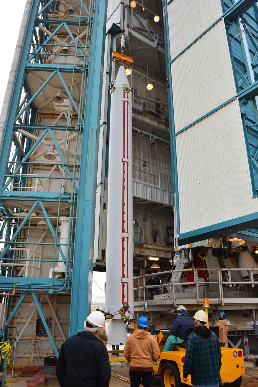 Technicians and engineers at Space Launch Complex 2 at Vandenberg Air Force Base in California, lift a United Launch Alliance/Orbital ATK solid rocket motor for mating to a Delta II rocket in preparation for launch of the Joint Polar Satellite System-1 (JPSS-1) later this year. JPSS, a next-generation environmental satellite system, is a collaborative program between the National Oceanic and Atmospheric Administration (NOAA) and NASA.