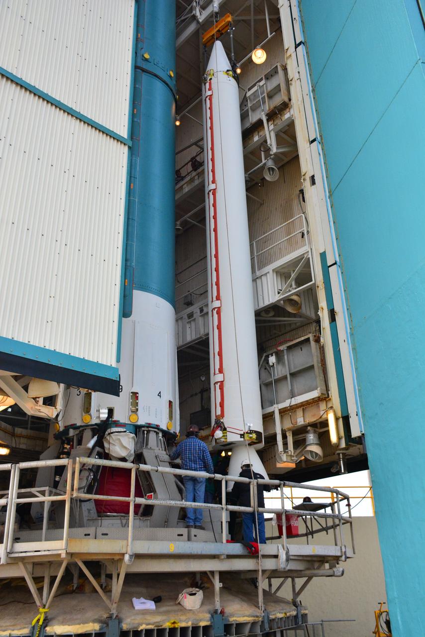 Technicians and engineers at Space Launch Complex 2 at Vandenberg Air Force Base in California, lift a United Launch Alliance/Orbital ATK solid rocket motor for mating to a Delta II rocket in preparation for launch of the Joint Polar Satellite System-1 (JPSS-1) later this year. JPSS, a next-generation environmental satellite system, is a collaborative program between the National Oceanic and Atmospheric Administration (NOAA) and NASA.