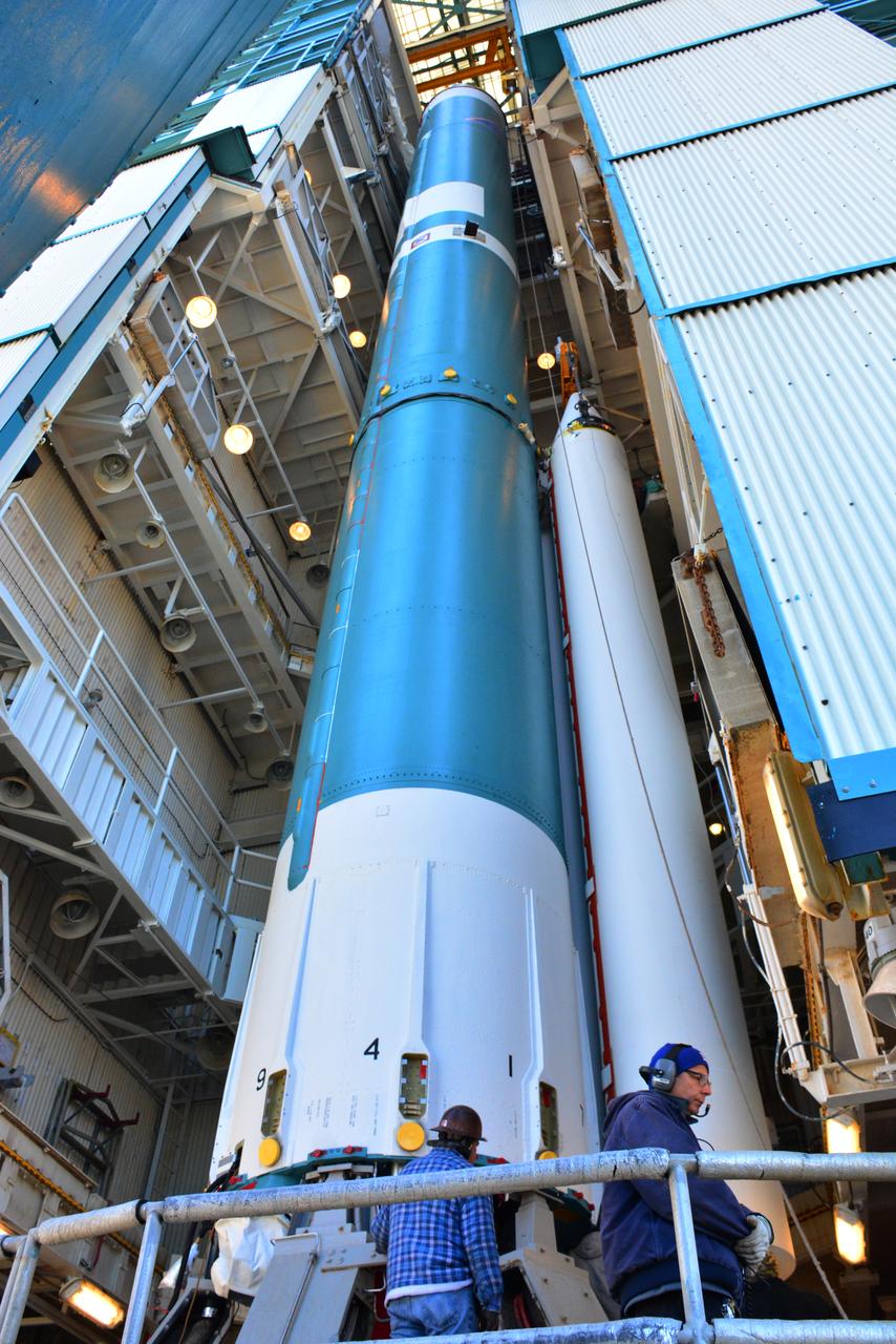 Technicians and engineers at Space Launch Complex 2 at Vandenberg Air Force Base in California, mate a United Launch Alliance/Orbital ATK solid rocket motor to a Delta II rocket in preparation for launch of the Joint Polar Satellite System-1 (JPSS-1) later this year. JPSS, a next-generation environmental satellite system, is a collaborative program between the National Oceanic and Atmospheric Administration (NOAA) and NASA.