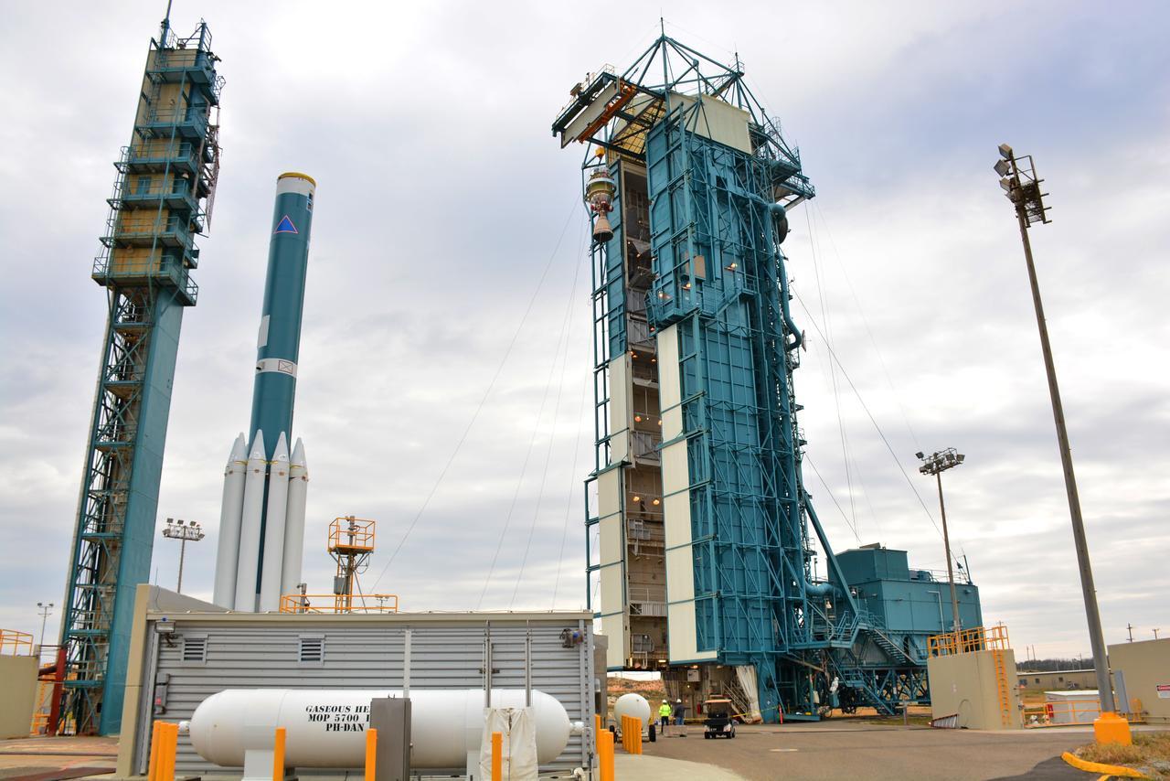 At Vandenberg Air Force Base in California, a United Launch Alliance Delta II second stage is hoisted into the gantry at Space Launch Complex 2. It will be mounted atop first stage of the rocket, seen on the left, as preparations continue for the launch of the Joint Polar Satellite System-1 (JPSS-1) later this year. JPSS, a next-generation environmental satellite system, is a collaborative program between the National Oceanic and Atmospheric Administration (NOAA) and NASA.