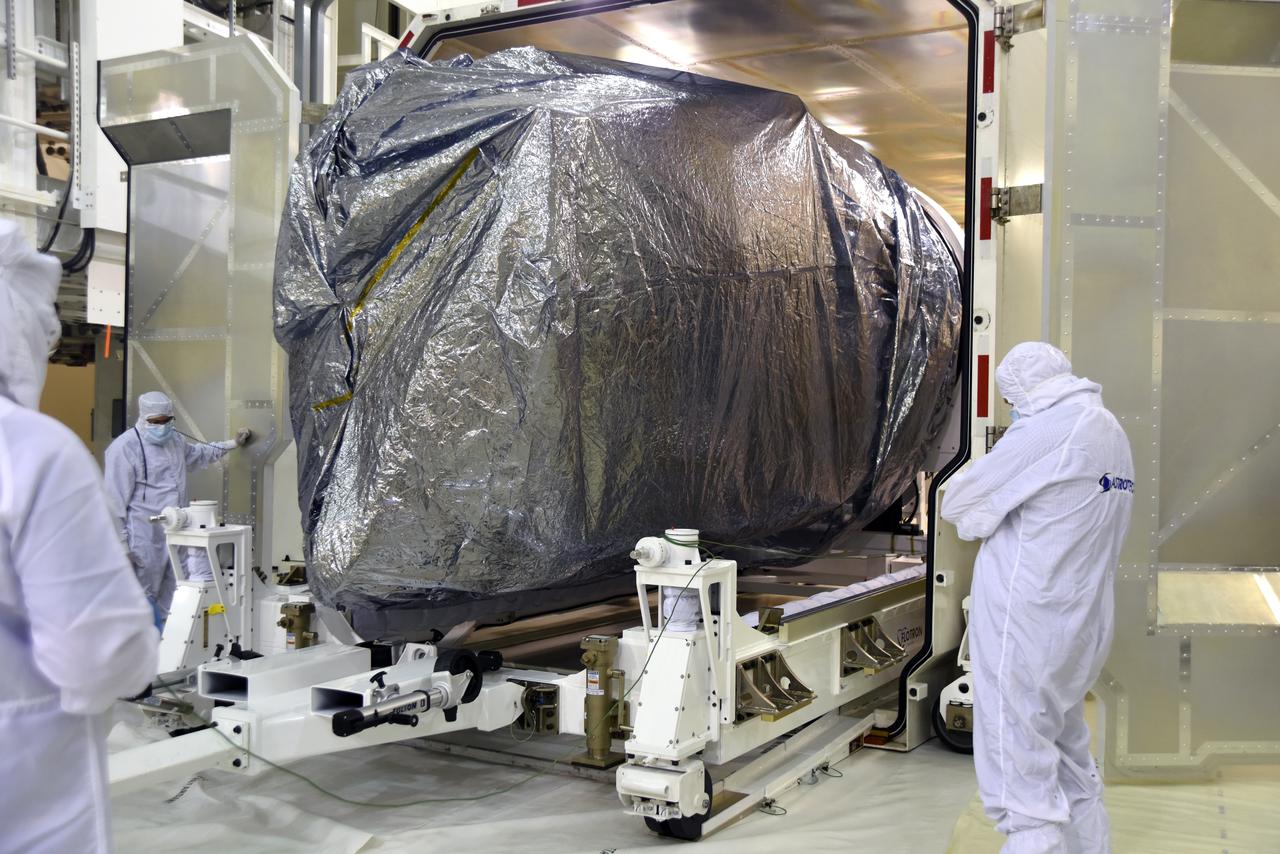 Inside the Astrotech Processing Facility at Vandenberg Air Force Base in California, technicians and engineers remove the Joint Polar Satellite System-1, or JPSS-1 from it shipping container. JPSS is the first in a series four next-generation environmental satellites in a collaborative program between the National Oceanic and Atmospheric Administration (NOAA) and NASA. The satellite is scheduled to liftoff Nov. 10, 2017 atop a United Launch Alliance Delta II rocket.