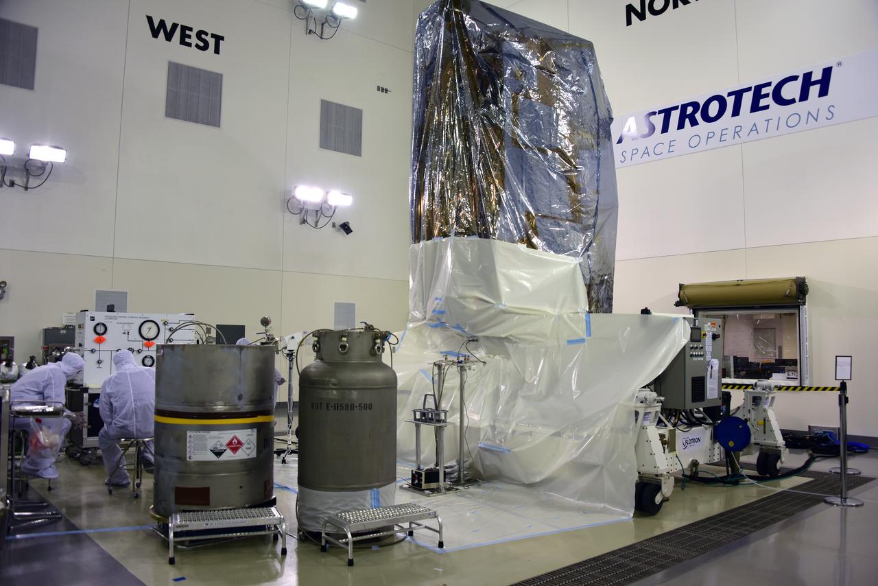 NOAA's Joint Polar Satellite System-1, or JPSS-1, remains wrapped in a protective covering after removal from its shipping container at the Astrotech Processing Facility at Vandenberg Air Force Base in California. The spacecraft is being prepared for its upcoming liftoff aboard a United Launch Alliance Delta II rocket from Vandenberg's Space Launch Complex-2W. JPSS-1 is the first in a series four next-generation environmental satellites in a collaborative program between NOAA and NASA.