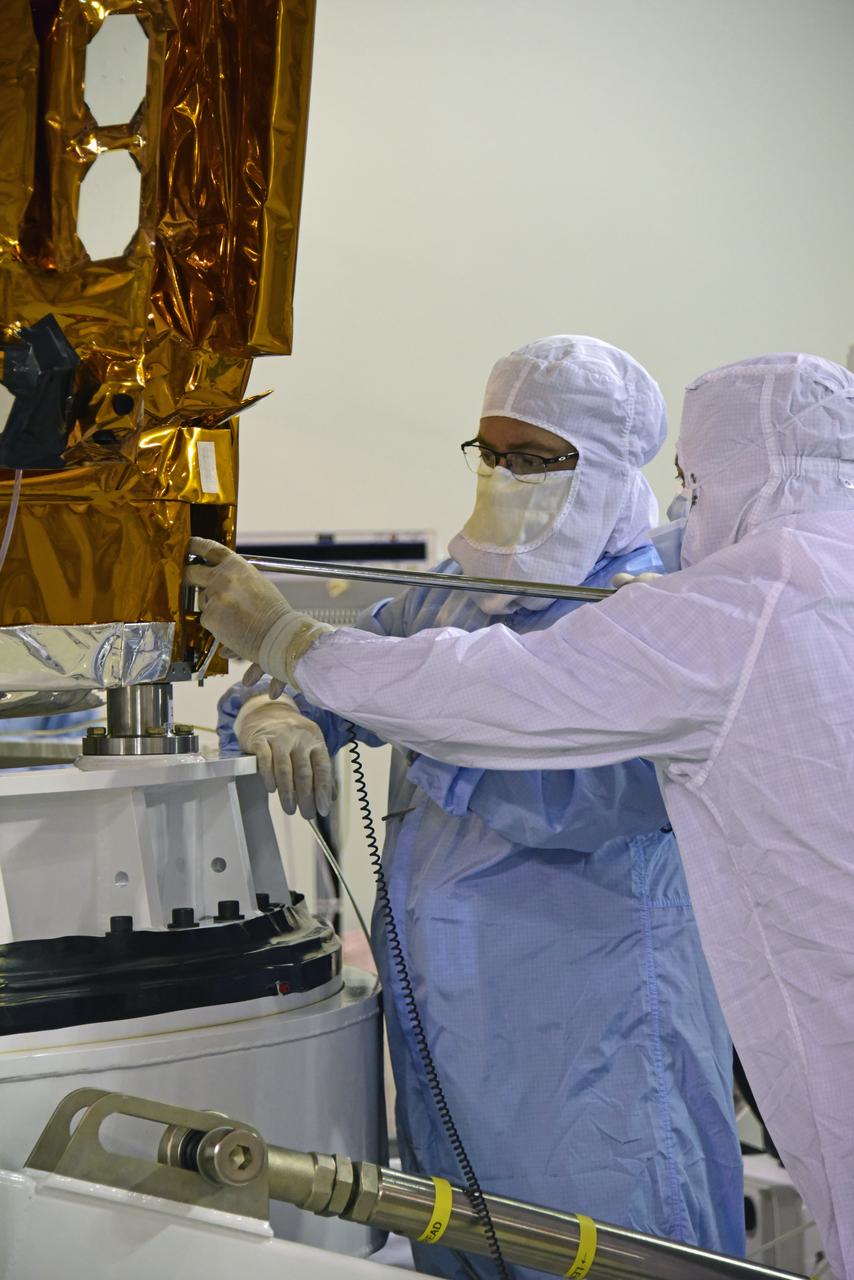 NOAA's Joint Polar Satellite System-1, or JPSS-1, remains wrapped in a protective covering after removal from its shipping container at the Astrotech Processing Facility at Vandenberg Air Force Base in California. Technicians prepare the spacecraft for its move to a payload attach fitting. JPSS-1 will liftoff aboard a United Launch Alliance Delta II rocket from Vandenberg's Space Launch Complex-2. JPSS-1 is the first in a series of four next-generation environmental satellites in a collaborative program between NOAA and NASA. 