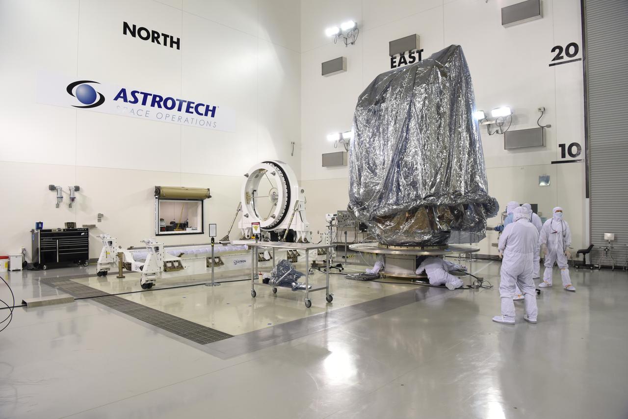 In the Astrotech Processing Facility at Vandenberg Air Force Base in California, the Joint Polar Satellite System-1, or JPSS-1, spacecraft is prepared for placing it in a protective container, then mounting on a transport trailer for its move to Space Launch Complex 2. At the pad, JPSS-1 will be lifted for mating atop a United Launch Alliance Delta II rocket. Built by Ball Aerospace and Technologies Corp. of Boulder, Colorado, JPSS is the first in a series four next-generation environmental satellites in a collaborative program between the NOAA and NASA. Liftoff is scheduled to take place from Vandenberg's Space Launch Complex 2.
