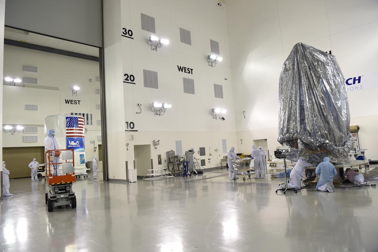 JPSS-1 Spacecraft Canning and Lift to Transport Trailer at the Astrotech facility located at Vandenberg Air Force Station in California.