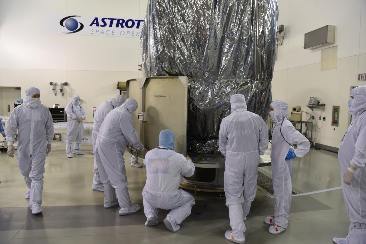 In the Astrotech Processing Facility at Vandenberg Air Force Base in California, the Joint Polar Satellite System-1, or JPSS-1, spacecraft is wrapped in a protective covering prior to technicians and engineers placing it in a protective container. It then will be mounted on a transport trailer for its move to Space Launch Complex 2. At the pad, JPSS-1 will be lifted for mating atop a United Launch Alliance Delta II rocket. Built by Ball Aerospace and Technologies Corp. of Boulder, Colorado, JPSS is the first in a series four next-generation environmental satellites in a collaborative program between the NOAA and NASA. Liftoff is scheduled to take place from Vandenberg's Space Launch Complex 2.