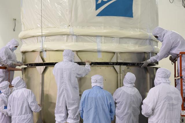 NASA image: JPSS-1 Spacecraft Canning and Lift to Transport Trailer