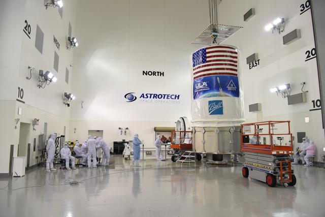 NASA image: JPSS-1 Spacecraft Canning and Lift to Transport Trailer