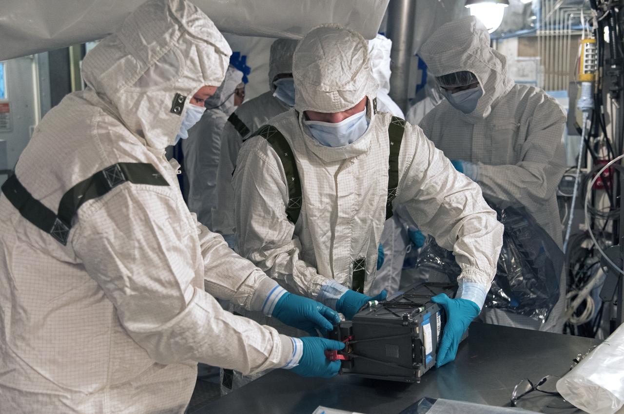 At Vandenberg Air Force Base in California, technicians and engineers prepare a Poly Picosatellite Orbital Deployer, or P-POD, container for installation on the Joint Polar Satellite System-1, or JPSS-1, spacecraft. P-PODS are auxiliary payloads launched aboard NASA expendable launch vehicles carrying up to three small CubeSats. The small cube-shaped satellites are part of NASA’s Educational Launch of Nanosatellite, or ELaNa, missions. The small payloads are designed and built by students from high school-level classes up to college and university students. JPSS is the first in a series of four next-generation environmental satellites in a collaborative program between the NOAA and NASA. Liftoff from Vandenberg's Space Launch Compex-2 atop a United Launch Alliance Delta II rocket is scheduled for 1:47 a.m. PST (4:47 a.m. EST), on Nov. 14, 2017.