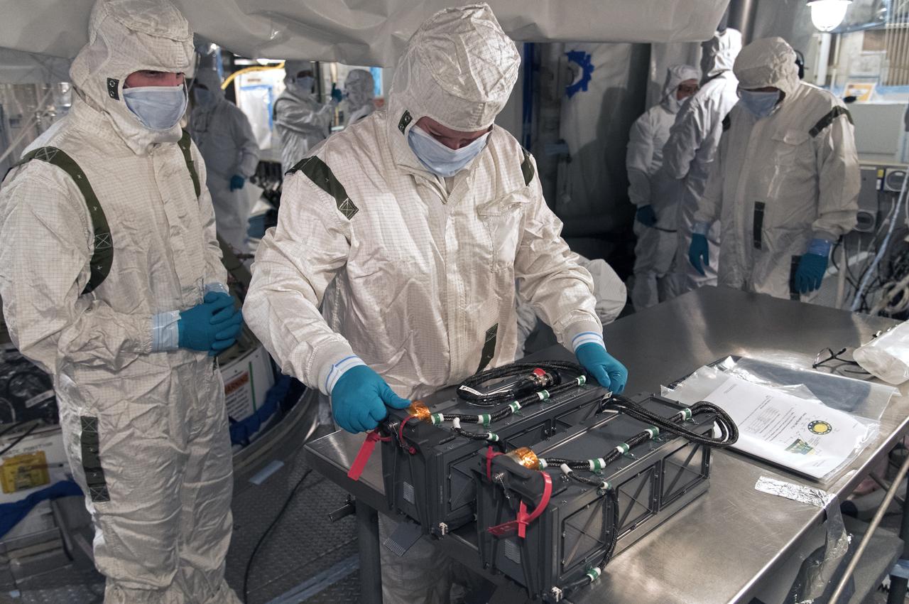 At Vandenberg Air Force Base in California, technicians and engineers prepare a Poly Picosatellite Orbital Deployer, or P-POD, container for installation on the Joint Polar Satellite System-1, or JPSS-1, spacecraft. P-PODS are auxiliary payloads launched aboard NASA expendable launch vehicles carrying up to three small CubeSats. The small cube-shaped satellites are part of NASA’s Educational Launch of Nanosatellite, or ELaNa, missions. The small payloads are designed and built by students from high school-level classes up to college and university students. JPSS is the first in a series of four next-generation environmental satellites in a collaborative program between the NOAA and NASA. Liftoff from Vandenberg's Space Launch Compex-2 atop a United Launch Alliance Delta II rocket is scheduled for 1:47 a.m. PST (4:47 a.m. EST), on Nov. 14, 2017.