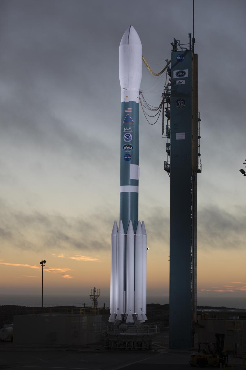 At Vandenberg Air Force Base in California, the gantry rolls back at Space Launch Complex 2 in preparation for the liftoff of the Joint Polar Satellite System-1, or JPSS-1, spacecraft. The United Launch Alliance Delta II rocket now is poised to boost the satellite to a polar orbit. Built by Ball Aerospace and Technologies Corp. of Boulder, Colorado, JPSS is the first in a series four next-generation environmental satellites in a collaborative program between NOAA and NASA. The satellite is scheduled to liftoff at 1:47 a.m. PST (4:47 a.m. EST), on Nov. 14, 2017.