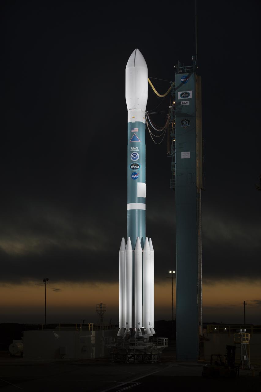 At Vandenberg Air Force Base in California, the gantry rolls back at Space Launch Complex 2 in preparation for the liftoff of the Joint Polar Satellite System-1, or JPSS-1, spacecraft. The United Launch Alliance Delta II rocket now is poised to boost the satellite to a polar orbit. Built by Ball Aerospace and Technologies Corp. of Boulder, Colorado, JPSS is the first in a series four next-generation environmental satellites in a collaborative program between NOAA and NASA. The satellite is scheduled to liftoff at 1:47 a.m. PST (4:47 a.m. EST), on Nov. 14, 2017.