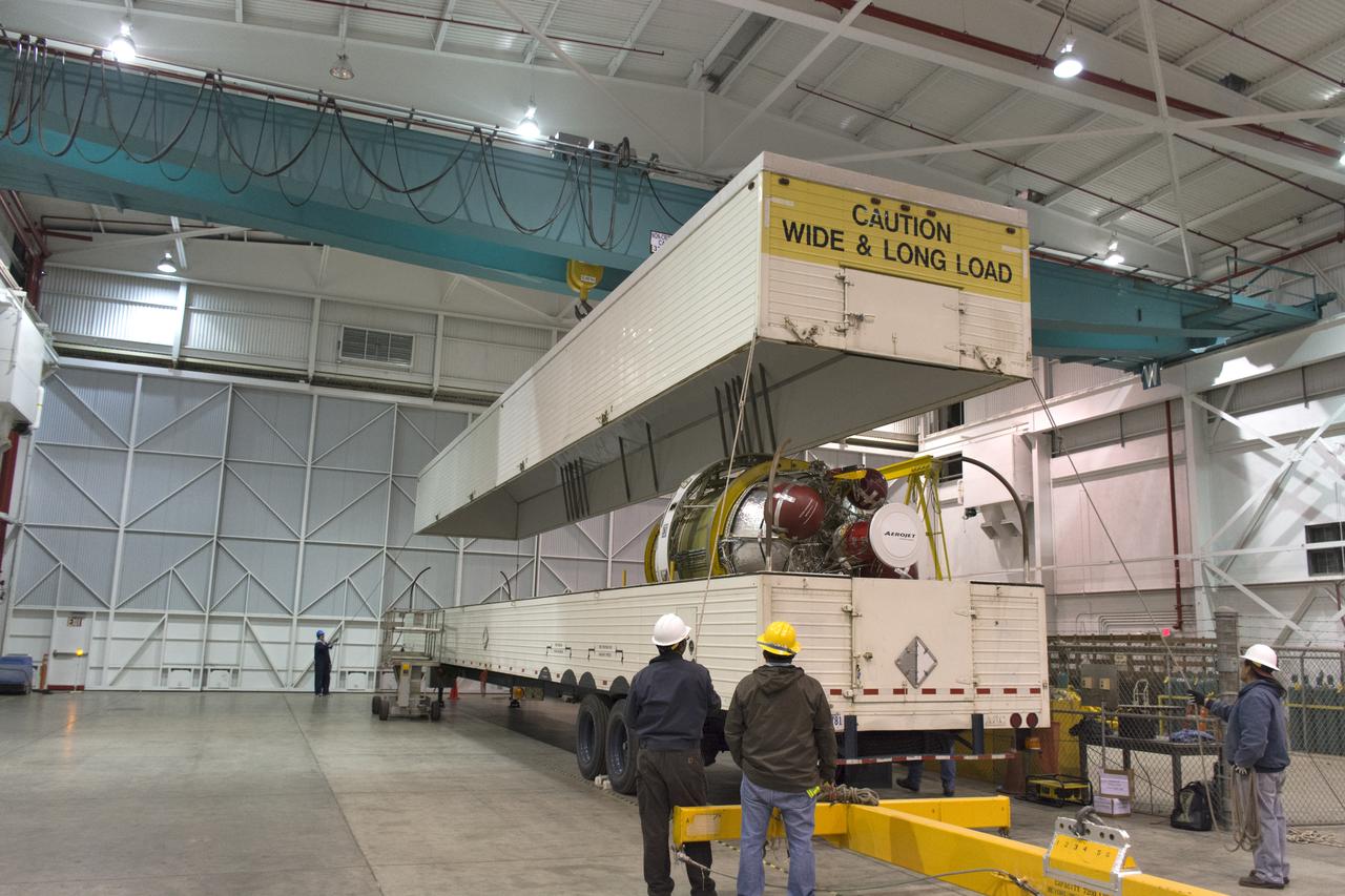 The United Launch Alliance Delta II second stage arrived at NASA's Building 1555 at Vandenberg Air Force Base in California. Technicians assist as a crane lifts the top of the shipping container up from the second stage so it can be offloaded and prepared for transport to the horizontal processing facility at Space Launch Complex-2. NASA's Ice, Cloud and land Elevation Satellite-2 (ICESat-2) will launch later this year on the final Delta II rocket. ICESat-2 will measure the height of a changing Earth, one laser pulse at a time, 10,000 laser pulses a second. The satellite will carry a single instrument, the Advanced Topographic Laser Altimeter System. ICESat-2 will help scientists investigate why, and how much our planet's frozen and icy areas, called the cryosphere, is changing in a warming climate. 