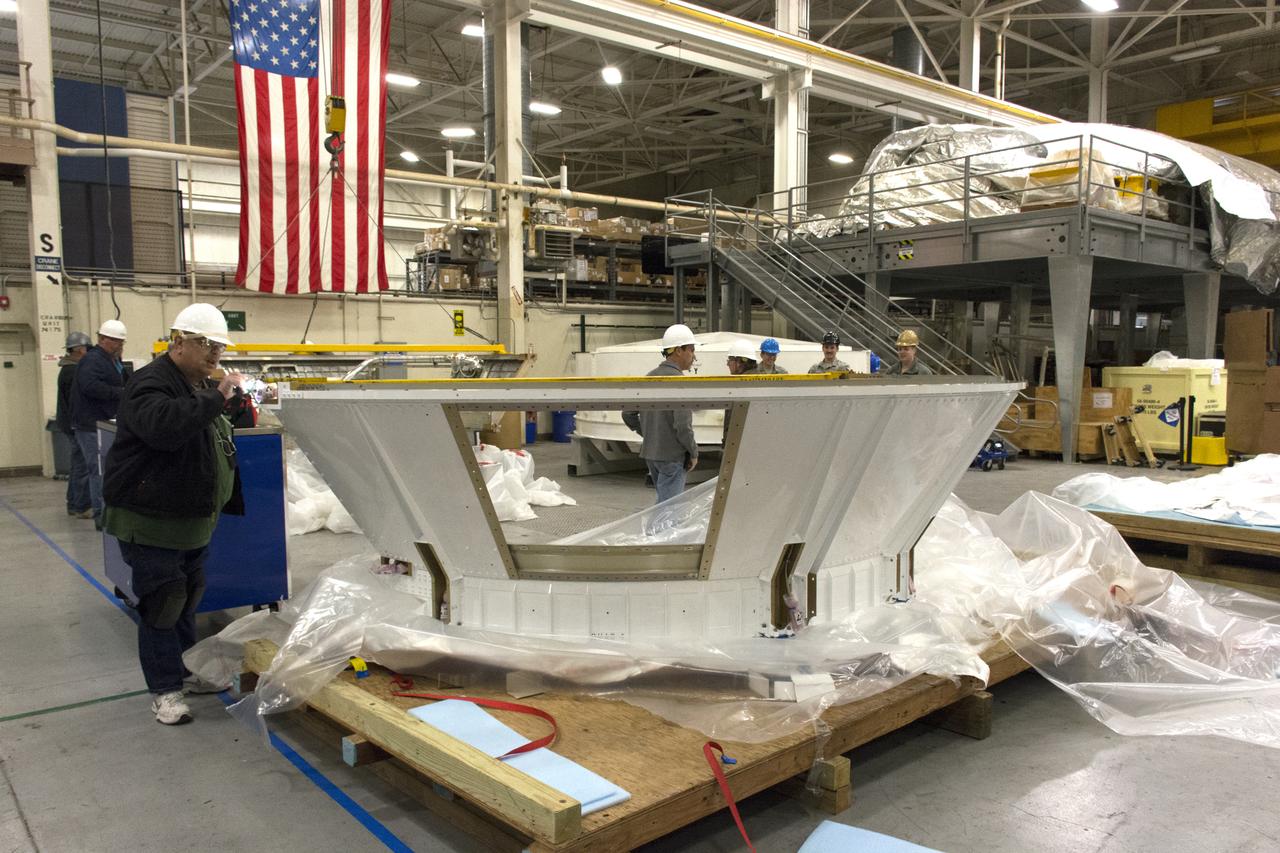 At Vandenberg Air Force Base in California, technicians inspect the boattail adaptor interface that will connect the Centaur upper stage to the payload fairing for NASA's upcoming Interior Exploration using Seismic Investigations, Geodesy and Heat Transport, or InSight, mission to land on Mars. InSight will liftoff atop a United Launch Alliance Atlas V rocket to send the spacecraft on the first mission to explore the Red Planet's deep interior. It will investigate processes that shaped the rocky planets of the inner solar system including Earth. Liftoff from Vandenberg is scheduled for May 5, 2018.