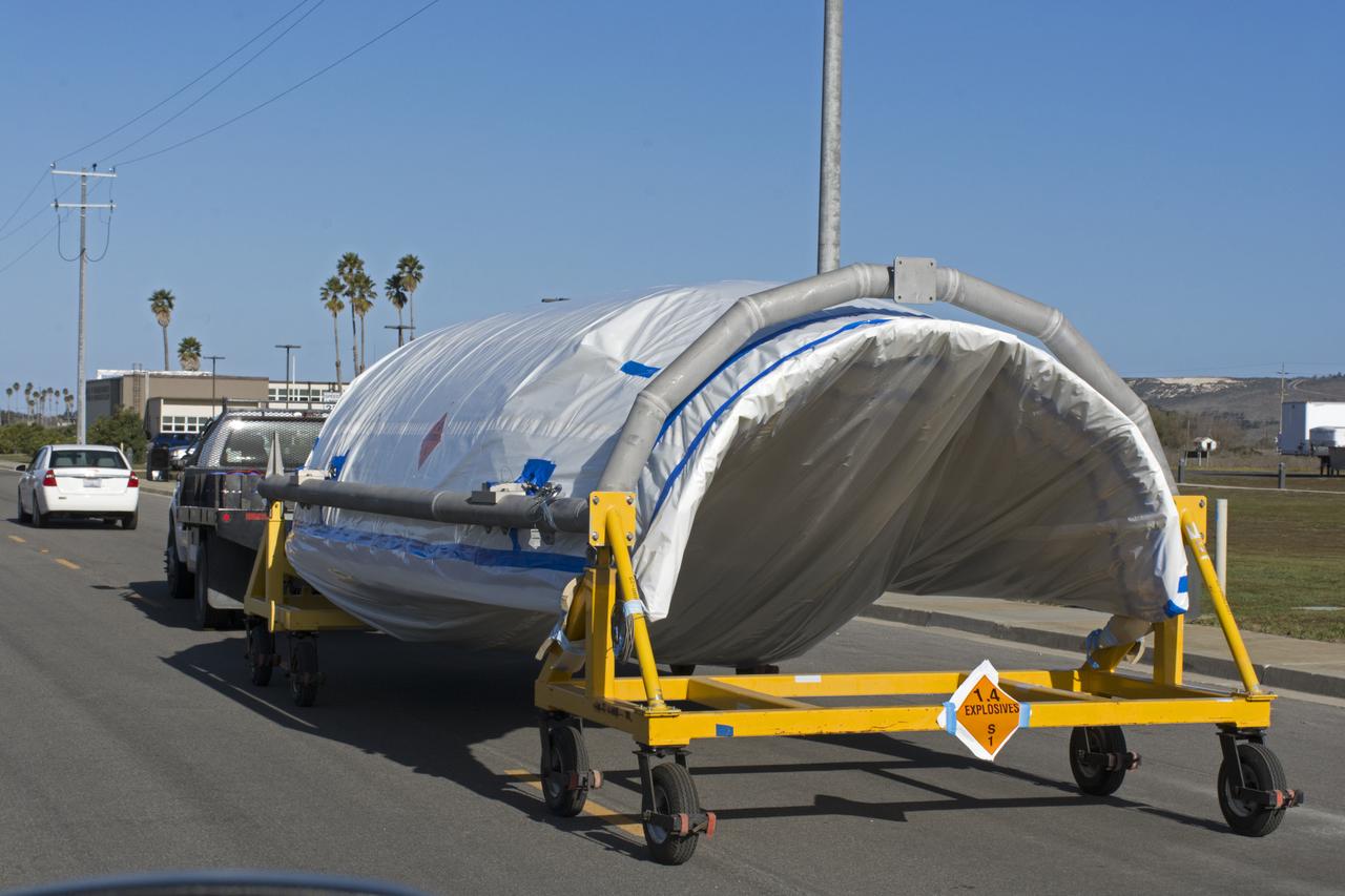 The first half of the United Launch Alliance (ULA) Delta II rocket payload fairing is transported from NASA's Building 836 to ULA's Building B8337 at Vandenberg Air Force Base in California. NASA's Ice, Cloud and land Elevation Satellite-2 (ICESat-2) will launch later this year on the final Delta II rocket. ICESat-2 will measure the height of a changing Earth, one laser pulse at a time, 10,000 laser pulses a second. The satellite will carry a single instrument, the Advanced Topographic Laser Altimeter System. ICESat-2 will help scientists investigate why, and how much our planet's frozen and icy areas, called the cryosphere, is changing in a warming climate. 
