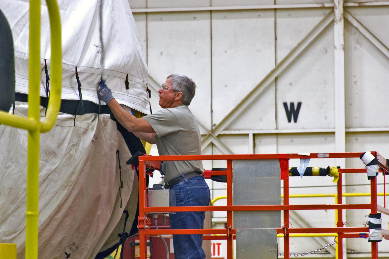 At Vandenberg Air Force Base in California, a cover is installed on a Centaur upper stage in preparation for its transport to Space Launch Complex 3. The Centaur will be mounted atop a United Launch Alliance Atlas V rocket to boost NASA's Interior Exploration using Seismic Investigations, Geodesy and Heat Transport, or InSight, mission to land on Mars. InSight is the first mission to explore the Red Planet's deep interior. It will investigate processes that shaped the rocky planets of the inner solar system including Earth. Liftoff is scheduled for May 5, 2018.