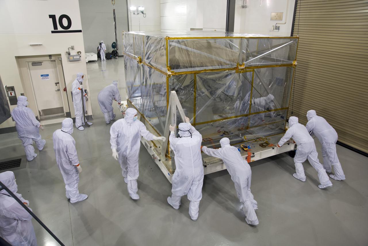 Inside the Astrotech processing facility at Vandenberg Air Force Base in California, NASA's Interior Exploration using Seismic Investigations, Geodesy and Heat Transport, or InSight, spacecraft has been removed from its shipping container and is being moved for removal of protective wrapping. InSight was developed and built by Lockheed-Martin Space Systems in Denver, Colorado, and is scheduled for liftoff is May 5, 2018. InSight is the first mission to land on Mars and explore the Red Planet's deep interior. It will investigate processes that shaped the rocky planets of the inner solar system including Earth.