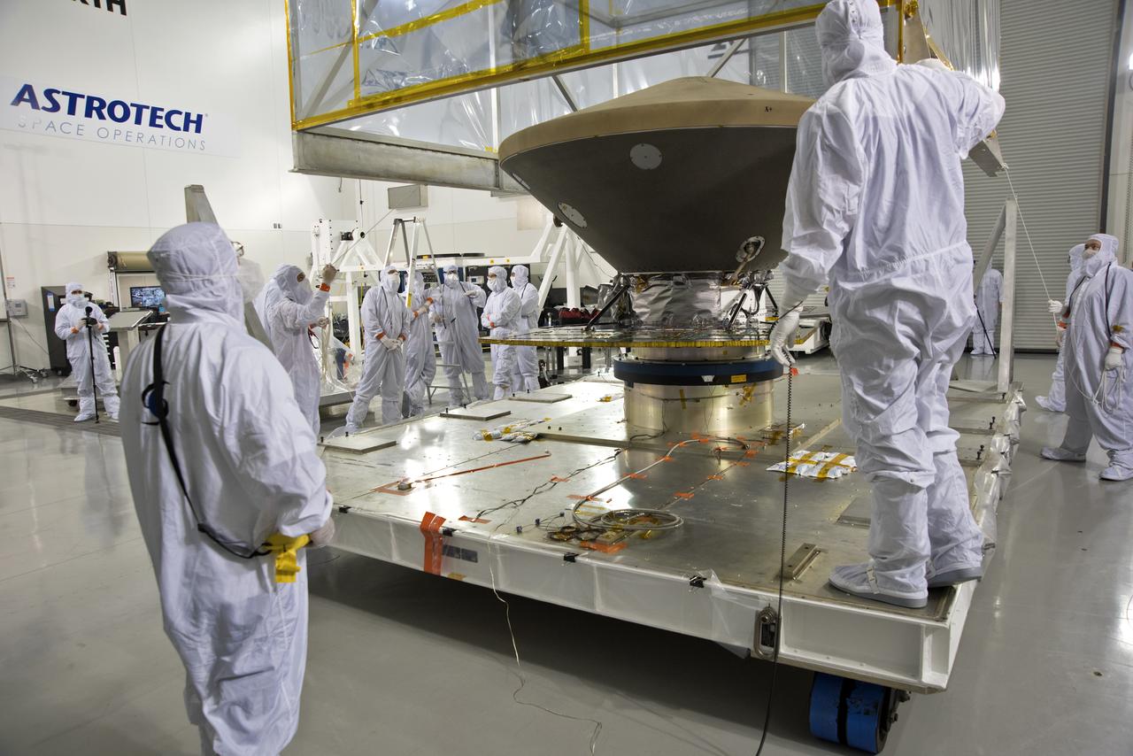 Inside the Astrotech processing facility at Vandenberg Air Force Base in California, the heatshield for NASA's Interior Exploration using Seismic Investigations, Geodesy and Heat Transport, or InSight, spacecraft is removed from protective wrapping. InSight was developed and built by Lockheed-Martin Space Systems in Denver, Colorado, and is scheduled for liftoff is May 5, 2018. InSight is the first mission to land on Mars and explore the Red Planet's deep interior. It will investigate processes that shaped the rocky planets of the inner solar system including Earth.