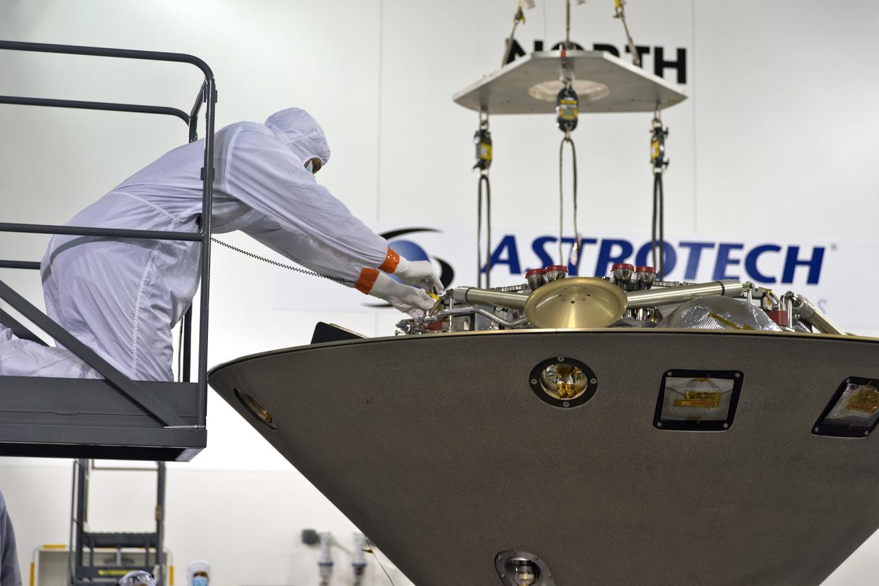 Inside the Astrotech processing facility at Vandenberg Air Force Base in California, NASA's Interior Exploration using Seismic Investigations, Geodesy and Heat Transport, or InSight, spacecraft is prepared to be lifted on to a rotation fixture for further testing. InSight was developed and built by Lockheed-Martin Space Systems in Denver, Colorado, and is scheduled for liftoff is May 5, 2018. InSight is the first mission to land on Mars and explore the Red Planet's deep interior. It will investigate processes that shaped the rocky planets of the inner solar system including Earth.
