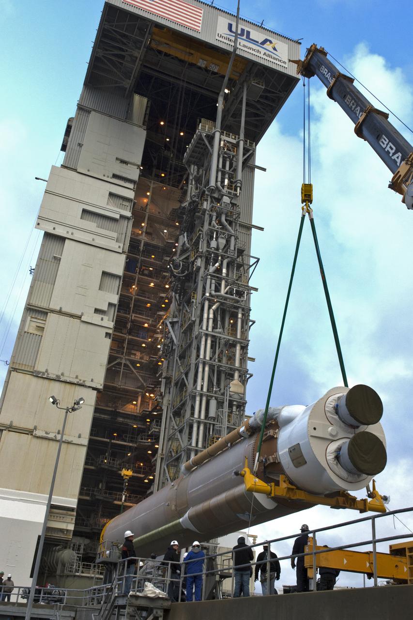 A crane lifts a United Launch Alliance Atlas V booster at Space Launch Complex 3 at Vandenberg Air Force Base in California. The rocket will launch NASA's Interior Exploration using Seismic Investigations, Geodesy and Heat Transport, or InSight, mission to land on Mars. InSight is the first mission to explore the Red Planet's deep interior. It will investigate processes that shaped the rocky planets of the inner solar system including Earth. Liftoff is scheduled for May 5, 2018.